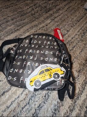 FRIENDS Black and Yellow Logo Tag Accent